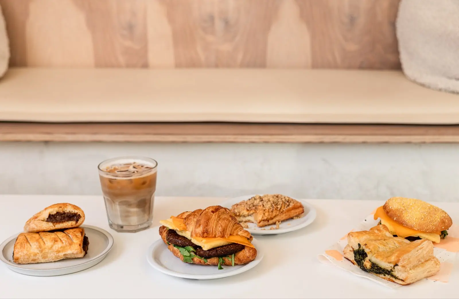 Pastries, sandwiches and iced coffee pictured on To Live For Bakery's official website
