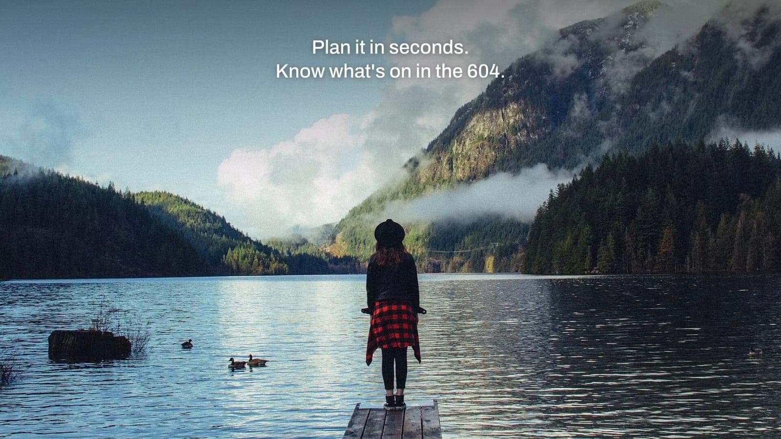 Misty mountains over Buntzen Lake, with the line Plan it in seconds, know what is on in the 604